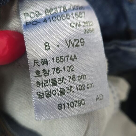 Levi's Women's Mid-rise Bermuda Stretch Pockets Cuffed Distressed Denim Shorts - Picture 6 of 8